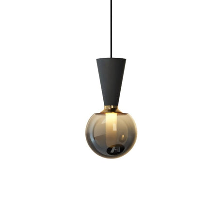 "Modern pendant light featuring a concrete cone-shaped top, metal accent, and smoky glass orb, showcasing a minimalist and sophisticated design."