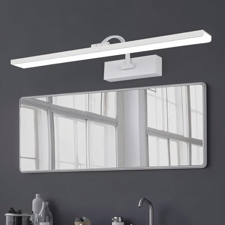 "A white LED vanity light mounted above a rectangular bathroom mirror with a sink and faucet."