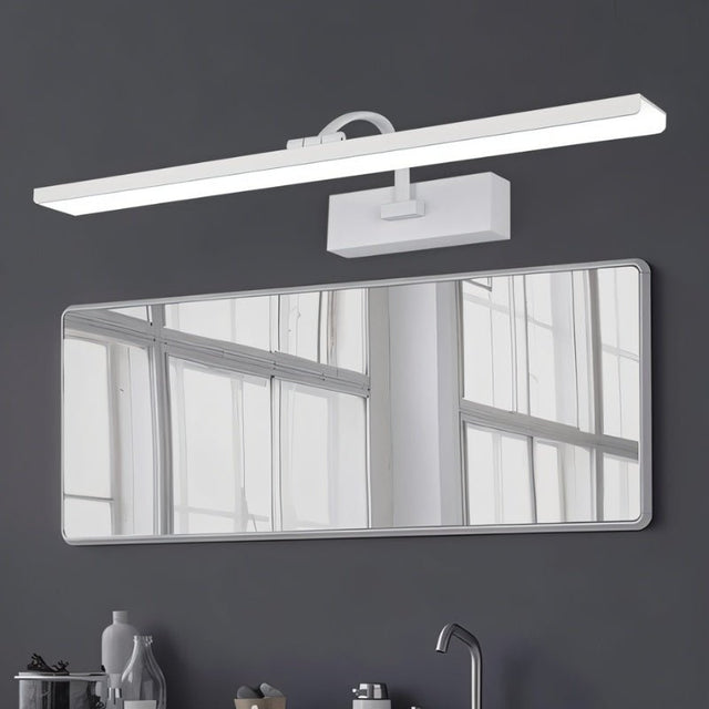 "A white LED vanity light mounted above a rectangular bathroom mirror with a sink and faucet."