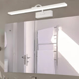"A white LED vanity light mounted above a bathroom mirror with a towel rack inside."