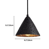 "A conical black travertine pendant light with dimensions marked, showing the stone's texture and warm light."