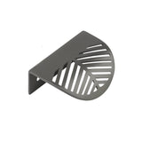 "A gunmetal grey leaf-shaped drawer pull on a white background."