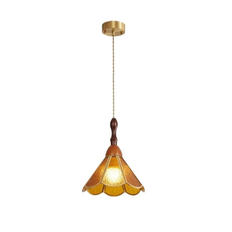"Handcrafted pendant light with amber stained glass panels and a copper framework, creating a warm ambient glow."