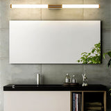 "A modern, linear LED vanity light mounted horizontally above a bathroom mirror and vanity."