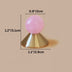 Pink spherical knob with brass cone base, measuring 1.2" height and 1.1" diameter.