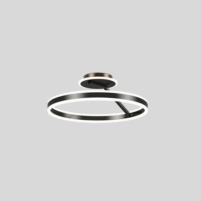 "A modern LED ceiling light with interlocking black rings, shown against a light gray background."