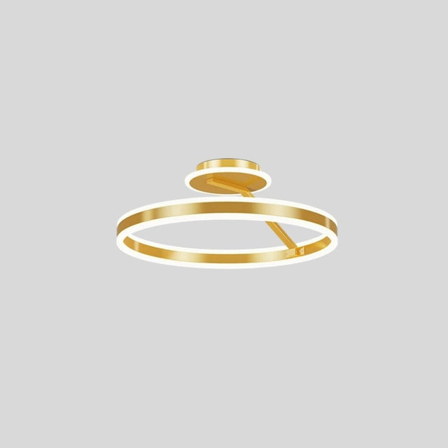 "A modern LED ceiling light with interlocking gold rings, shown against a light gray background."