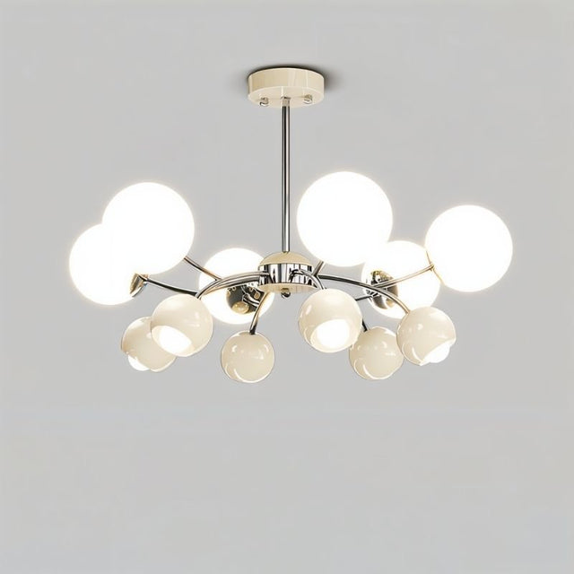 "An 8-light mid-century modern chandelier with white acrylic globe diffusers and a chrome frame, against a light gray background."