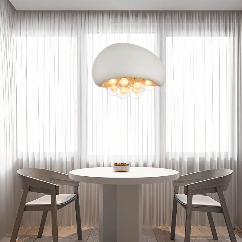 "pendant light with resin dome and illuminated globes, hanging above a modern dining table setup, warm ambiance"