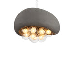 "close-up of gray resin dome pendant light with glowing globes, artistic and contemporary design"