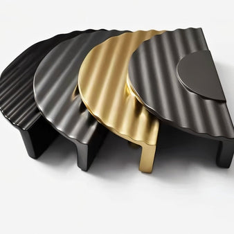 "Set of semi-circular drawer pulls in various finishes, ridged texture, zinc alloy construction."