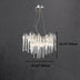 Modern round chandelier with icicle design, clear glass finish, dimensions 15.74" x 23.62" against a dark backdrop.