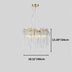 Round chandelier with gold accents and glass icicle-like features, suspended from a ceiling against a white background.