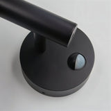 "Close-up of the motion sensor on a sleek, modern outdoor wall lamp."