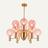 Luxury Gloral Chandelier with twelve pink glass globes and gold finish, designed for upscale living room or dining area lighting.
