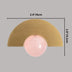 Gold half-moon knob with a pink sphere; dimensions are 2.4 inches wide and 1.6 inches tall.