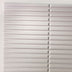 White wall panel featuring horizontal slats with a smooth finish, designed for modern interior decor.