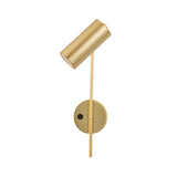 "A minimalist industrial gold bedside reading lamp with a cylindrical shade and adjustable arm, featuring a visible on/off switch on the wall mount, isolated on a white background."