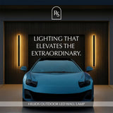 Helios LED Outdoor Wall Lamps flanking a garage, delivering sophisticated lighting that elevates curb appeal.