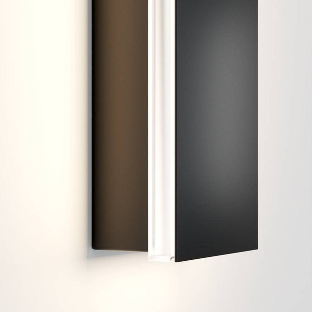 Detailed view of Helios LED wall light edge reveals acrylic diffuser and sleek metal finish for modern outdoor lighting.