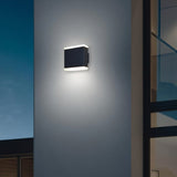 "Helor wall lamp featuring a sleek rectangular design with dual upward and downward light emission, perfect for enhancing both indoor and outdoor spaces with a modern and minimalist style."