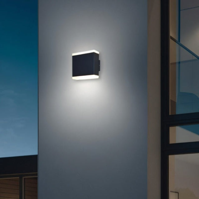 "Helor wall lamp featuring a sleek rectangular design with dual upward and downward light emission, perfect for enhancing both indoor and outdoor spaces with a modern and minimalist style."
