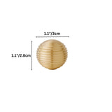 "Dimensions of a gold brass ribbed knob: 1.1 inches (3 cm) width and 1.1 inches (2.8 cm) height."