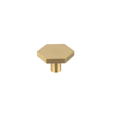 "Modern brass hexagon knob with a cylindrical mount, isolated on a white background."