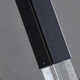  "Close-up detail of a modern pendant light showing a metal frame and textured crystal diffuser."