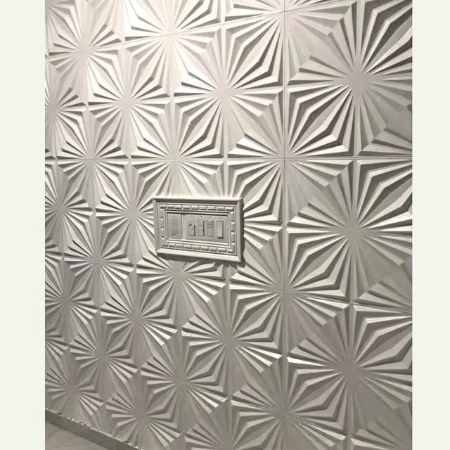 Close-up of Hite PVC Wall Panels with raised geometric pattern and integrated switch panel. Ideal for waterproof and durable wall finishes.
