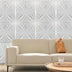 Hite PVC Wall Panels with 3D starburst texture featured behind a cream sofa. Durable and mold-proof for stylish living room upgrades.