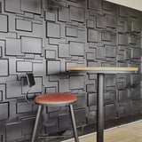 Black Hurain PVC Wall Panels with 3D square patterns, ideal for contemporary interiors and easy DIY installation.