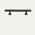 Black metal cabinet pull bar with two cylindrical mounting posts on a neutral background.