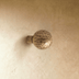 Textured mushroom-shaped cabinet knob with cylindrical stem, shown front view on white background with dimensions labeled.