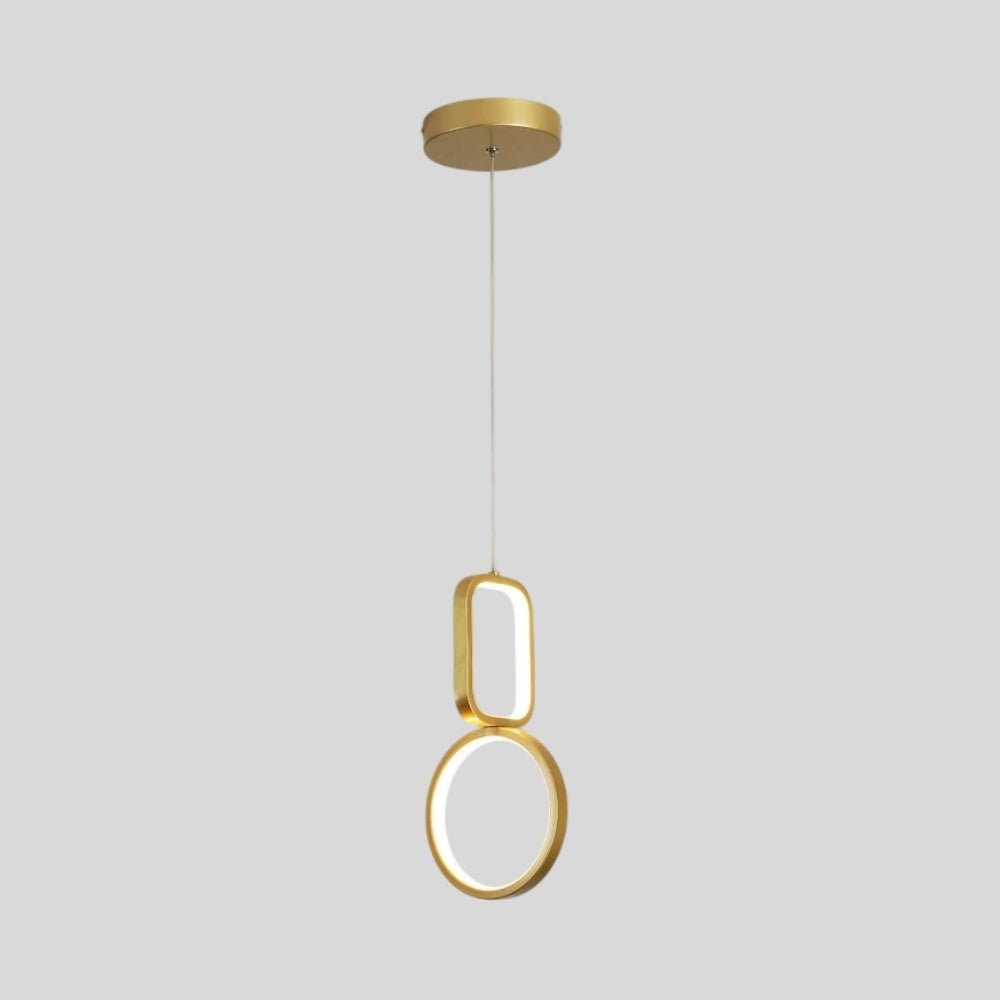 "Geometric pendant light with gold metal frame and acrylic diffusers, featuring circular and rectangular shapes, isolated on a light gray background."