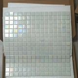 Close-up of Kacakar Mosaic Tiles sheet with iridescent white squares, perfect for DIY wall panel installations.