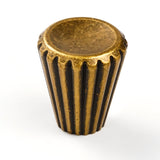 "A contemporary brass cone-shaped knob with sleek vertical grooves on the sides and a smooth, polished circular face."