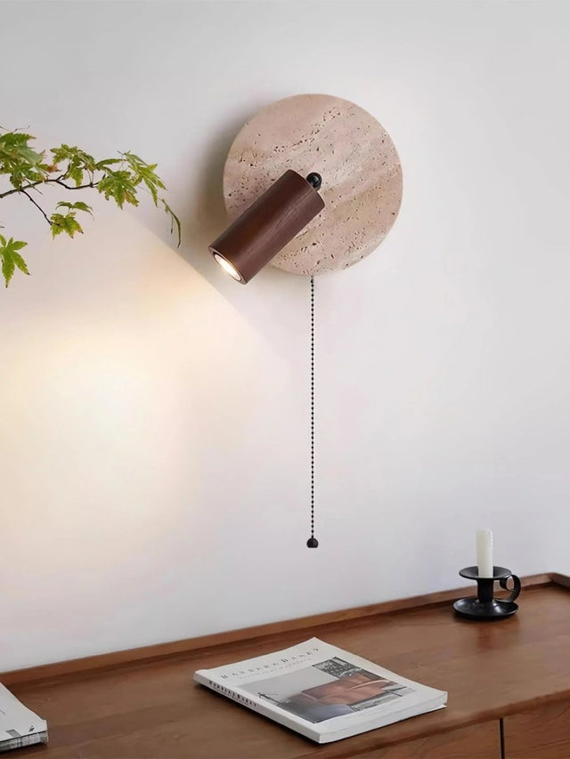 "Yellow travertine round wall lamp with wooden cylindrical shade and pull chain, modern bedside reading light."