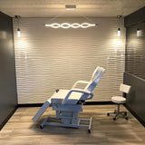 Kerso Wall Panel in a modern spa room with wave-textured PVC panels, enhancing the ambiance with a sleek, contemporary design.