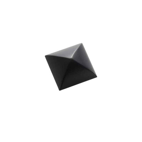 "A pyramid-shaped brass cabinet knob with a sharp geometric design, suitable for modern and industrial interiors."