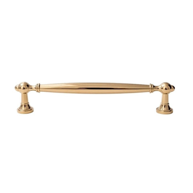 "A luxury polished gold brass pull bar with an elegant, timeless design, isolated on a white background."
