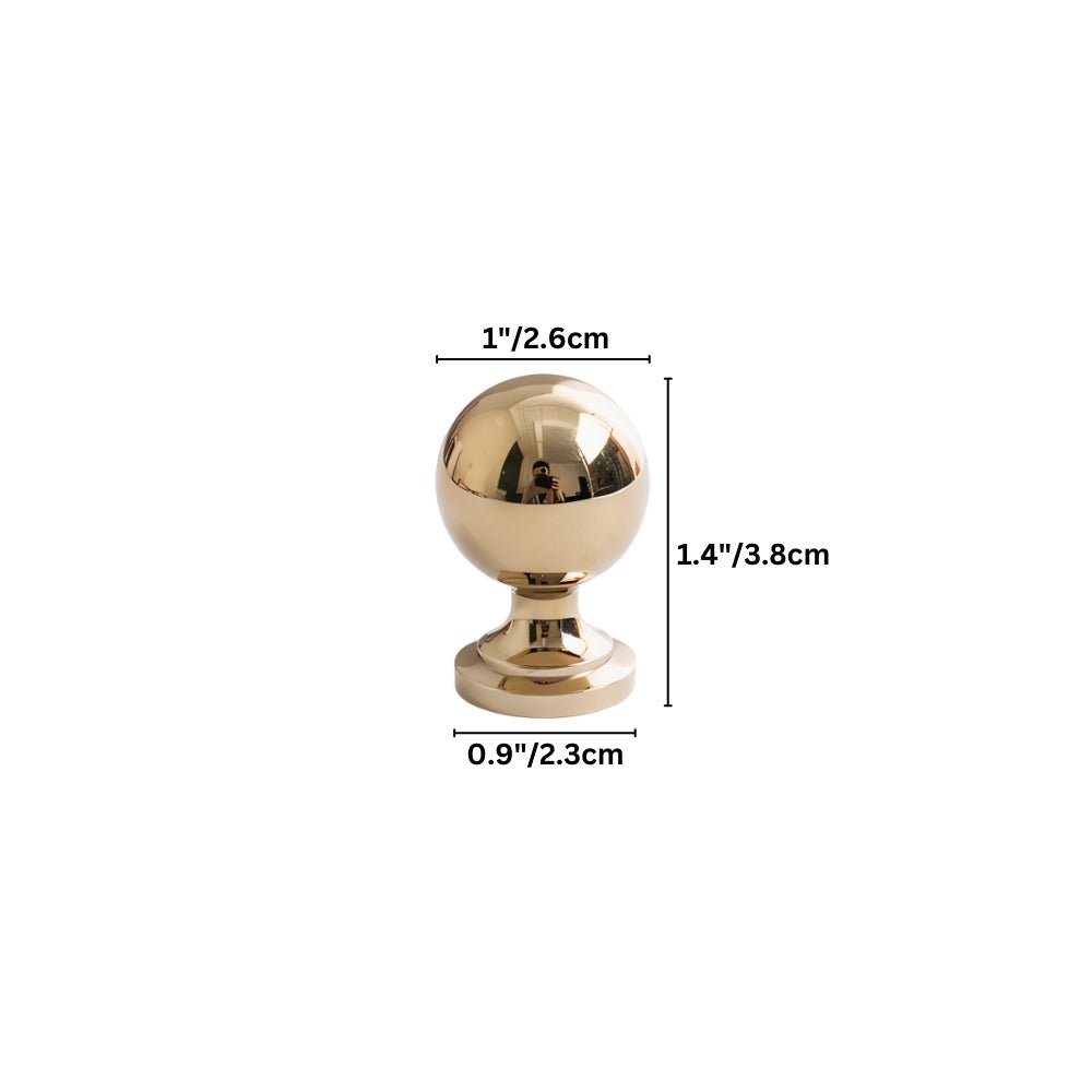 "Brass round ball knob with a classic design, suitable for cabinets, drawers, or furniture in transitional interiors."