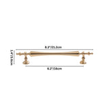 "Dimensions diagram of a brass pull bar with a tapered spindle design and intricate finials, showing measurements."
