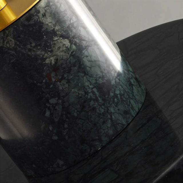 "Close-up of the green marble detailing on a modern pendant light, showcasing the texture and veining."