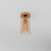 Brass ceiling light fixture with cylindrical amber glass shade against white background.