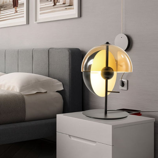Layers Contemporary Glass Table Lamp: With its stacked glass orbs in different sizes, this table lamp adds a contemporary touch to any space while providing soft, diffused light.