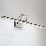 "A silver wall lamp with a linear LED bar and dual-arch mounting, shown illuminated against a plain white background."