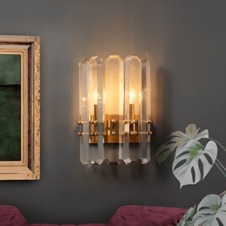 Lenvo Crystal Copper Wall Light mounted on a dark wall beside framed art, ideal for elegant bedroom or living room interiors.
