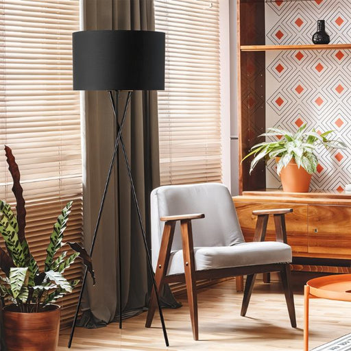 Leora Contemporary Arc Floor Lamp: Featuring a sleek chrome finish and a curved arm, this floor lamp adds a modern and minimalist touch to any room.