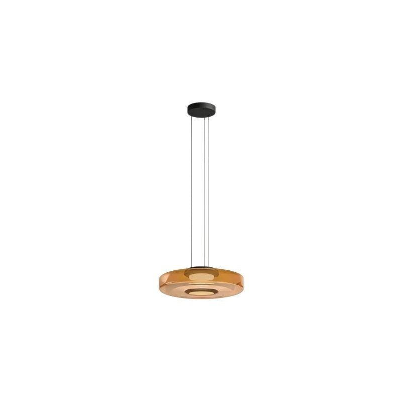 "A single amber glass disc pendant light."
